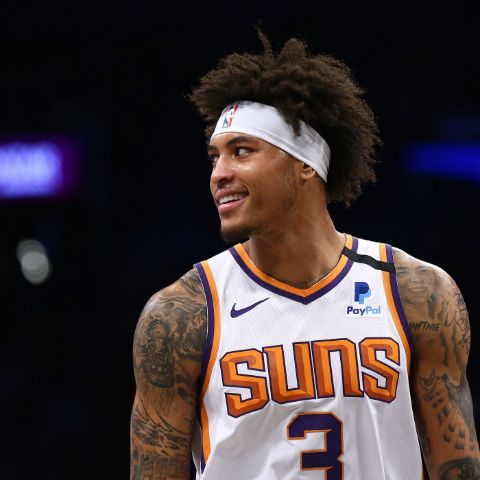Kelly Oubre Jr poses a picture in Phoenix Suns jersey.